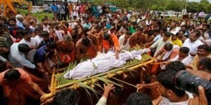 People Attend Funeral Of Crocodile
