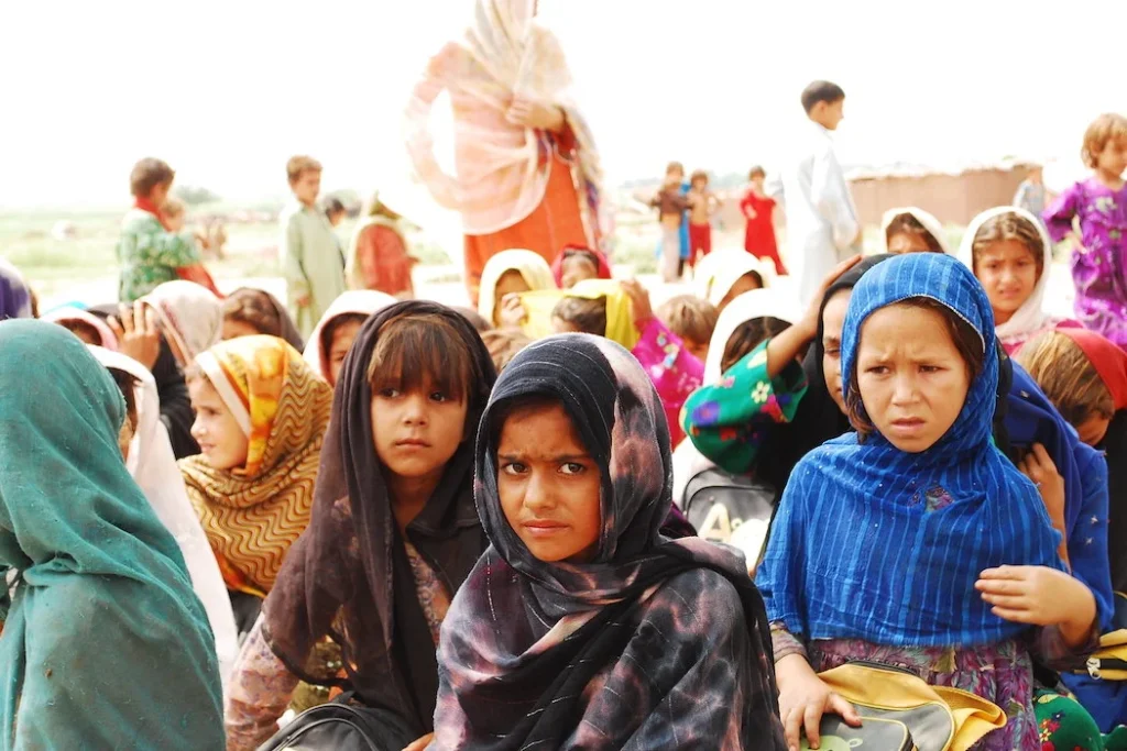 Thousands Of Afghan Refugees Arrive In Trucks At The Afghanistan-Pakistan Torkham Border