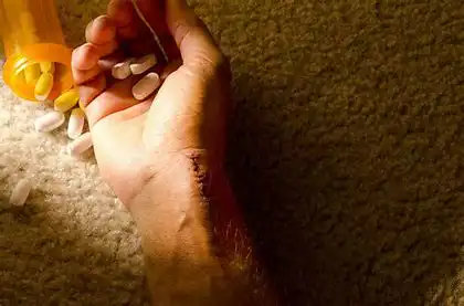 Man found hanging from a tree in suspected act of suicide