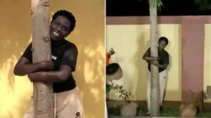 Ugandan Activist Sets Guinness World Record by Hugging Tree for 16 Hours